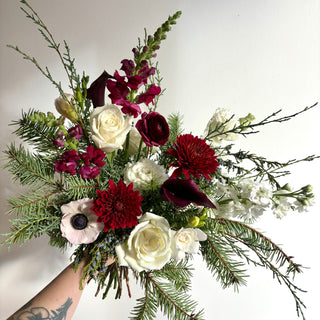 Bouquet of flowers with burgundy, plum, white, and green colours