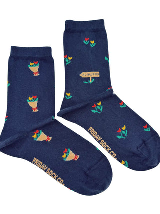 Pair of navy blue socks with tulips wrapped and unwrapped by Friday Sock co.
